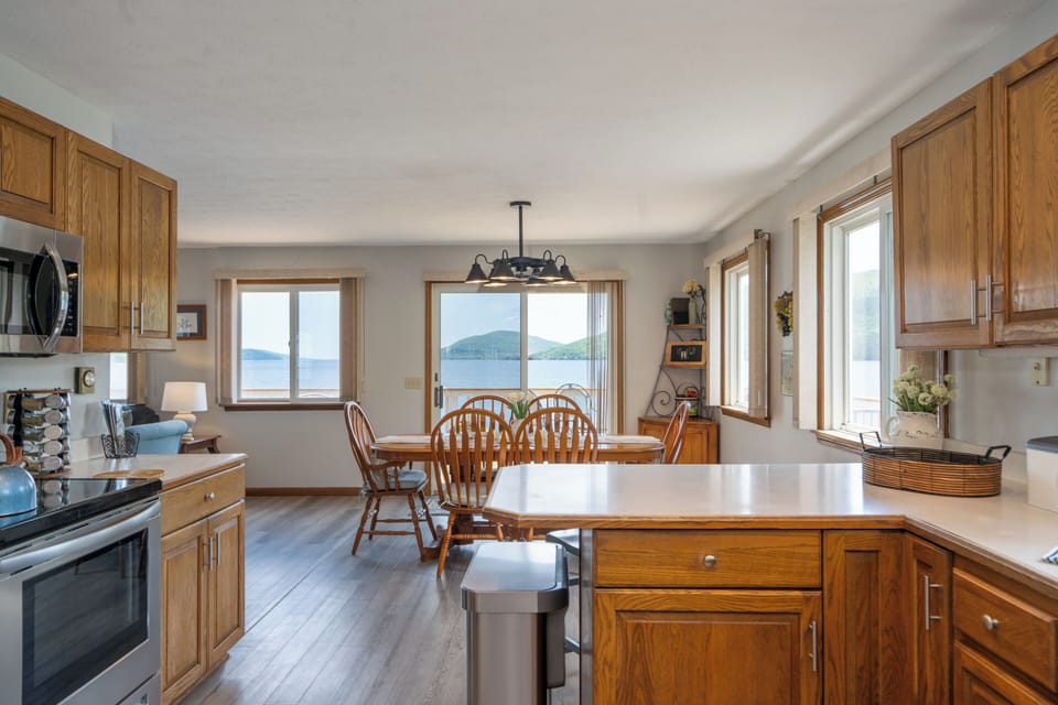 View  of kitchen island and dining table from kitchen 