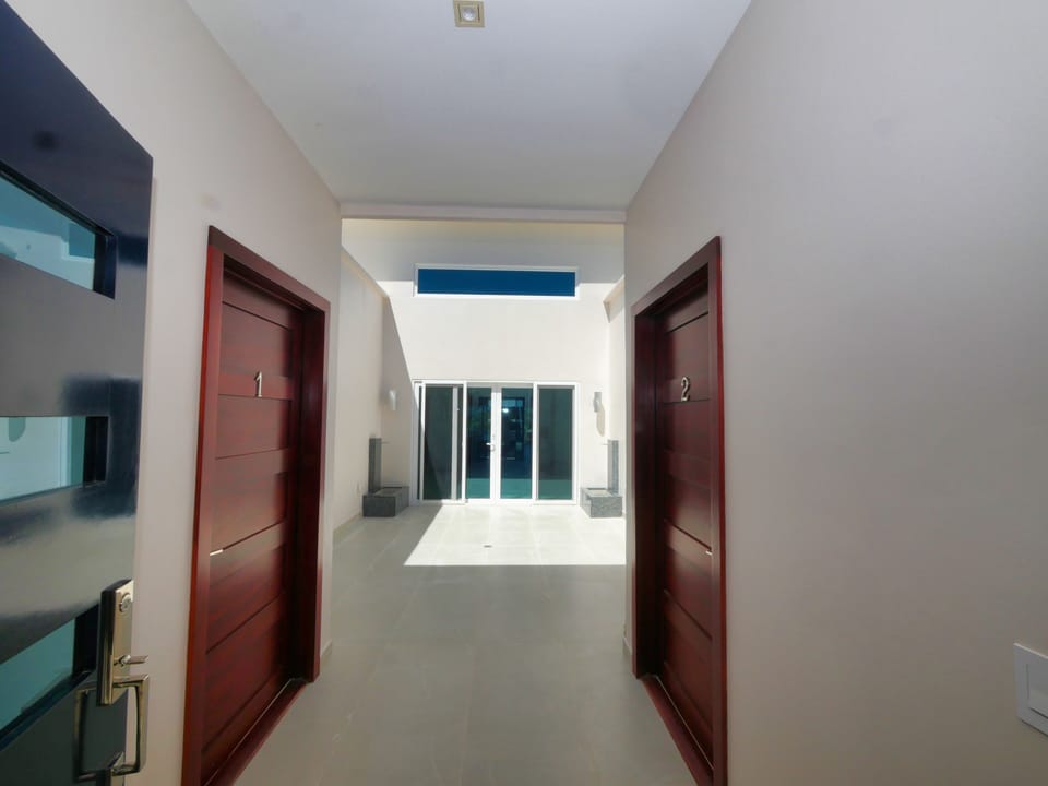 Entry to House, Studio one on left, Studio 2 on the right and main House 