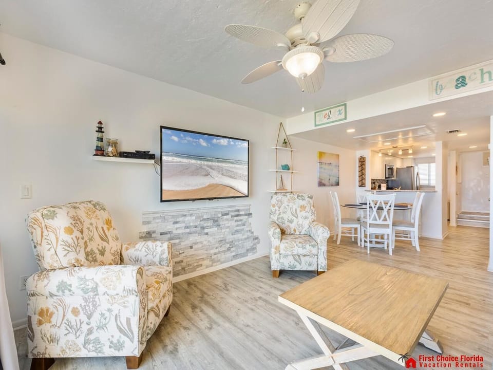 Cozy living room with beach-themed decor and open layout