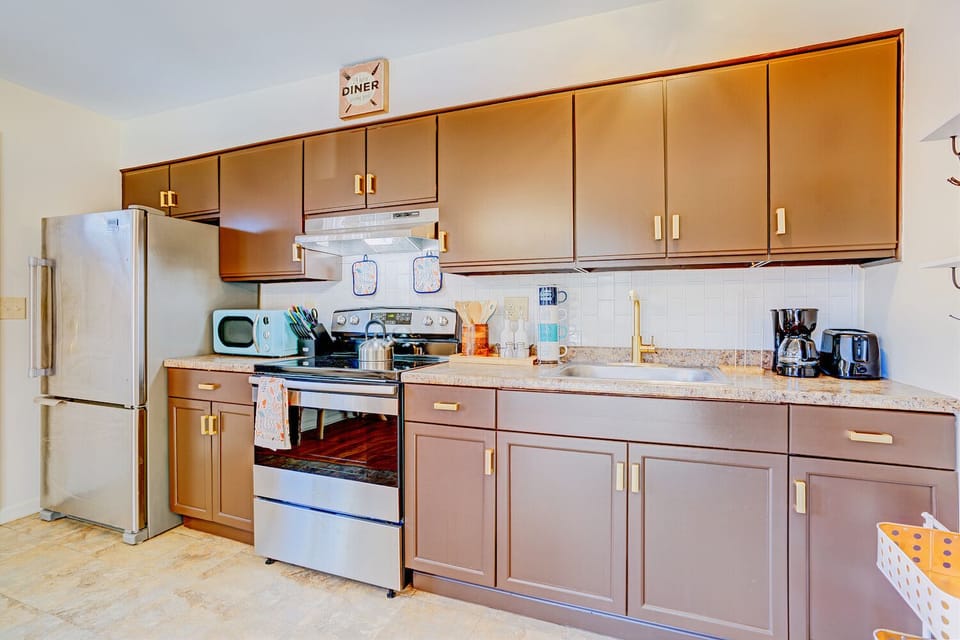 The kitchen has all of your cooking necessities, to include oils and spices