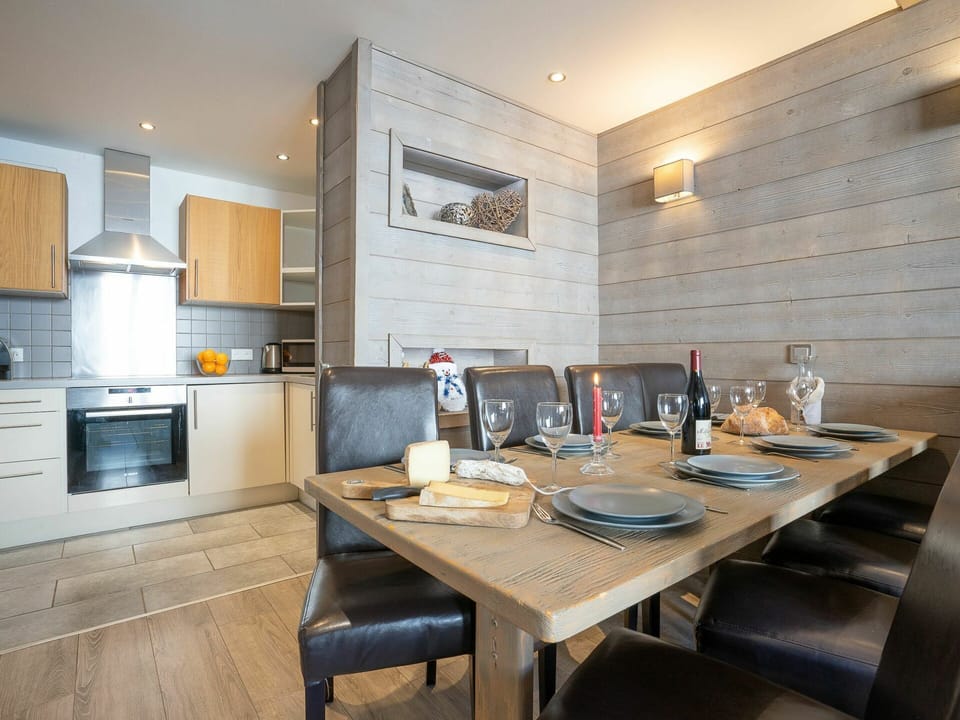 Table, Furniture, Countertop, Cabinetry, Wood, Kitchen, Chair, Flooring, Interior Design, Floor