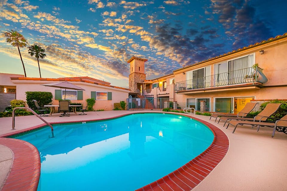 Communal pool with outdoor seating
