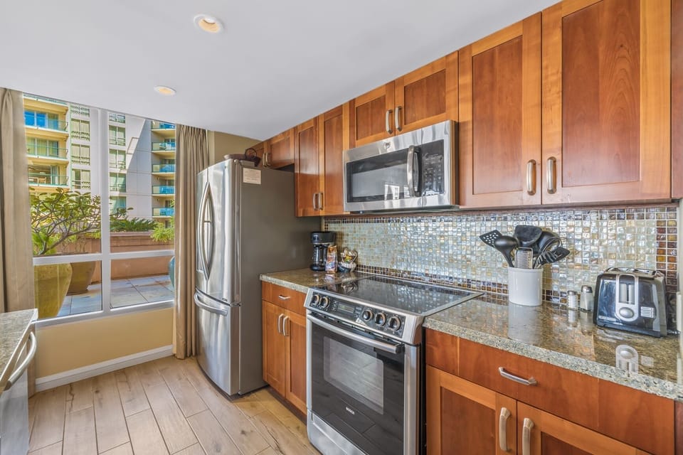 Condo, 2 Bedrooms | Private kitchen | Coffee/tea maker, fridge, oven, toaster