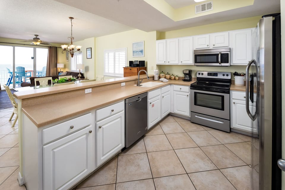 Kitchen - Make your favorite meals in this fully stocked kitchen with stainless steel appliances.