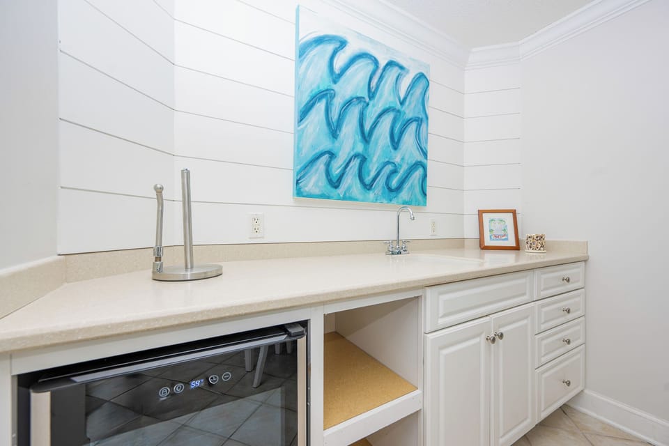 Grab a chilled drink from the fridge or create your favorite cocktail at the wet bar