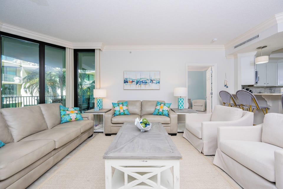 Unwind in the inviting living area, featuring a queen sofa sleeper, surrounded by vibrant decor