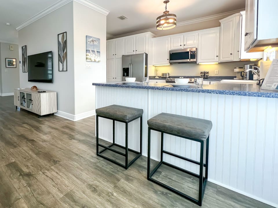 Grab a seat at the counter while preparing meals or enjoy a snack