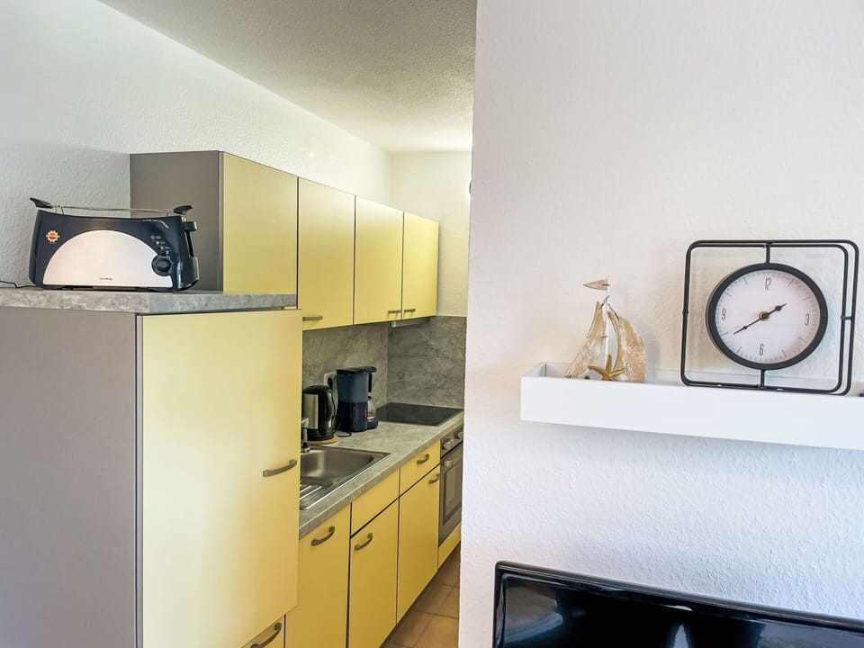 Interior Design, Wall, Flooring, Wood, Furniture, Floor, Countertop, Room, Ceiling, Kitchen