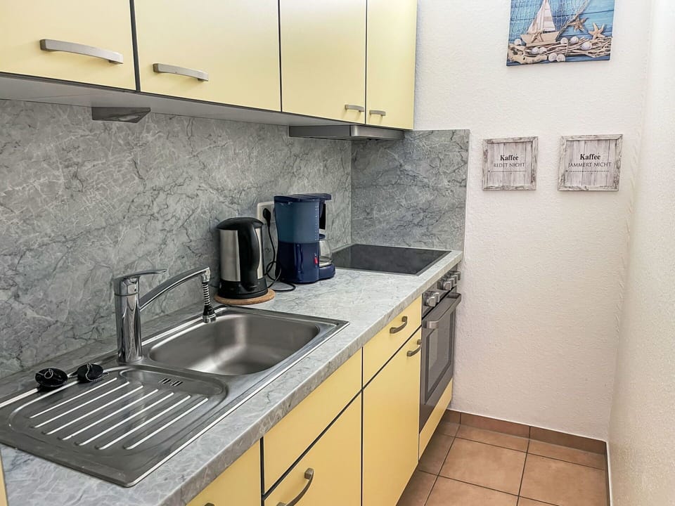 Kitchen, Countertop, Kitchen Sink, Kitchen Appliance, Major Appliance, Flooring, Plumbing Fixture, Sink, Cabinetry, Tap