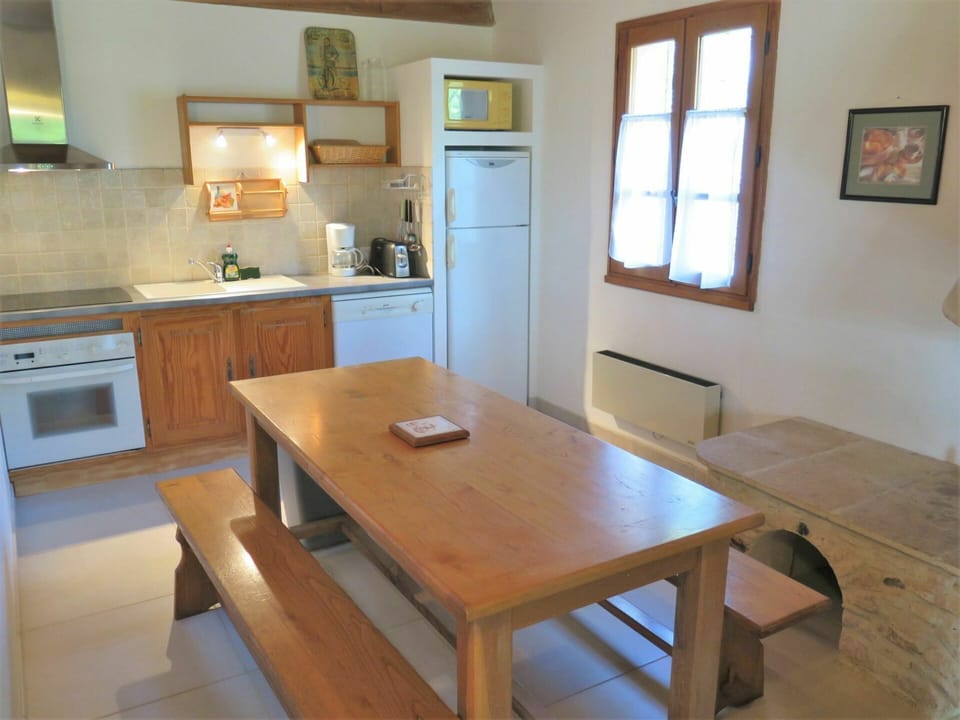 Table, Furniture, Cabinetry, Property, Picture Frame, Countertop, Wood, Window, Lighting, Kitchen Appliance