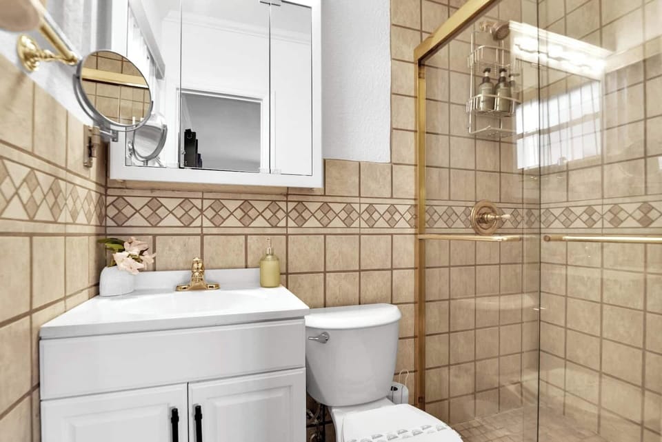 Ensuite bathroom for the primary bedroom with walk in shower