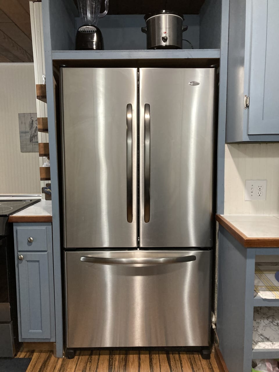 Full-sized refrigerator and freezer. 