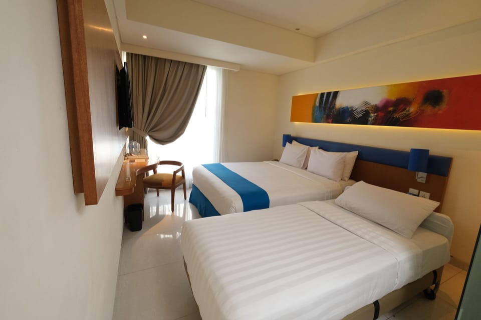 Premium bedding, down comforters, pillowtop beds, minibar