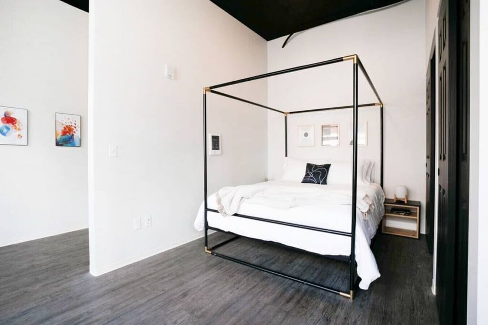 Soft linens and timeless design for a boutique-hotel feel.