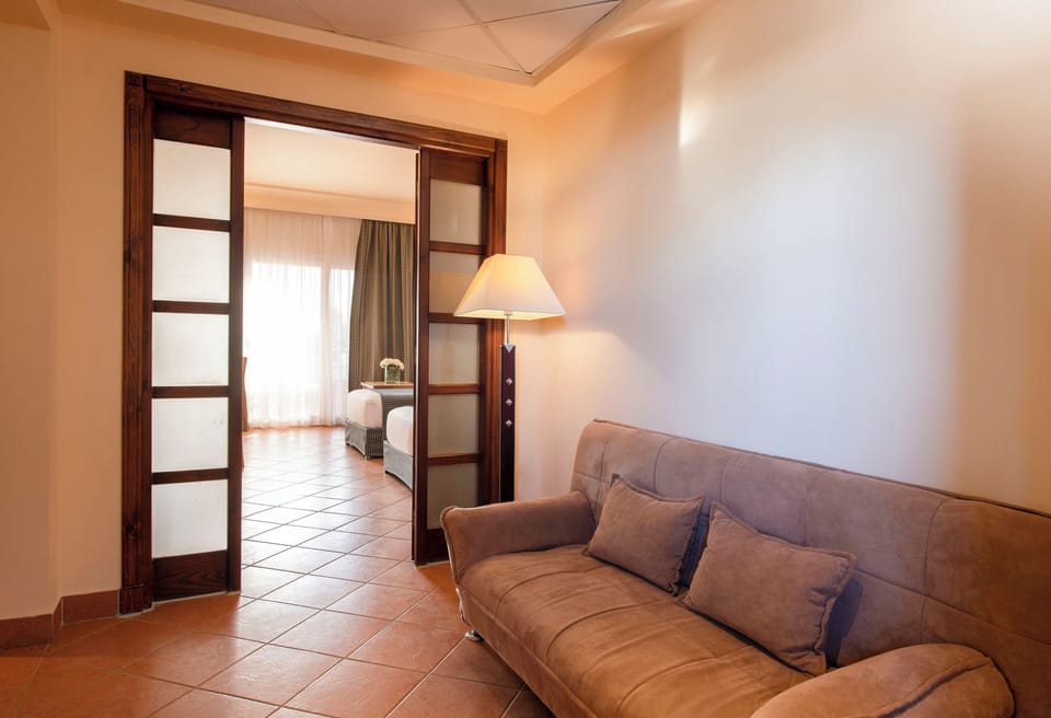 Egyptian cotton sheets, minibar, in-room safe, blackout drapes