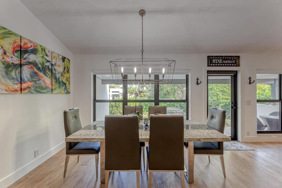 Open layout dining/family room. Dining table seating for 6. 6 extra folding chairs available to seat 12.