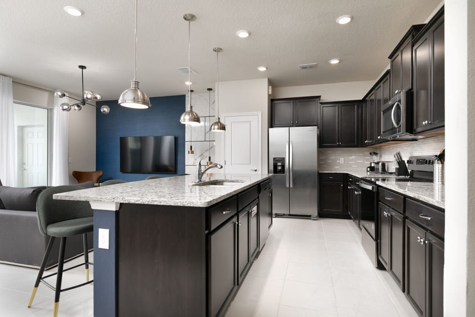 You'll love the refined black, navy, gray, and silver decor.