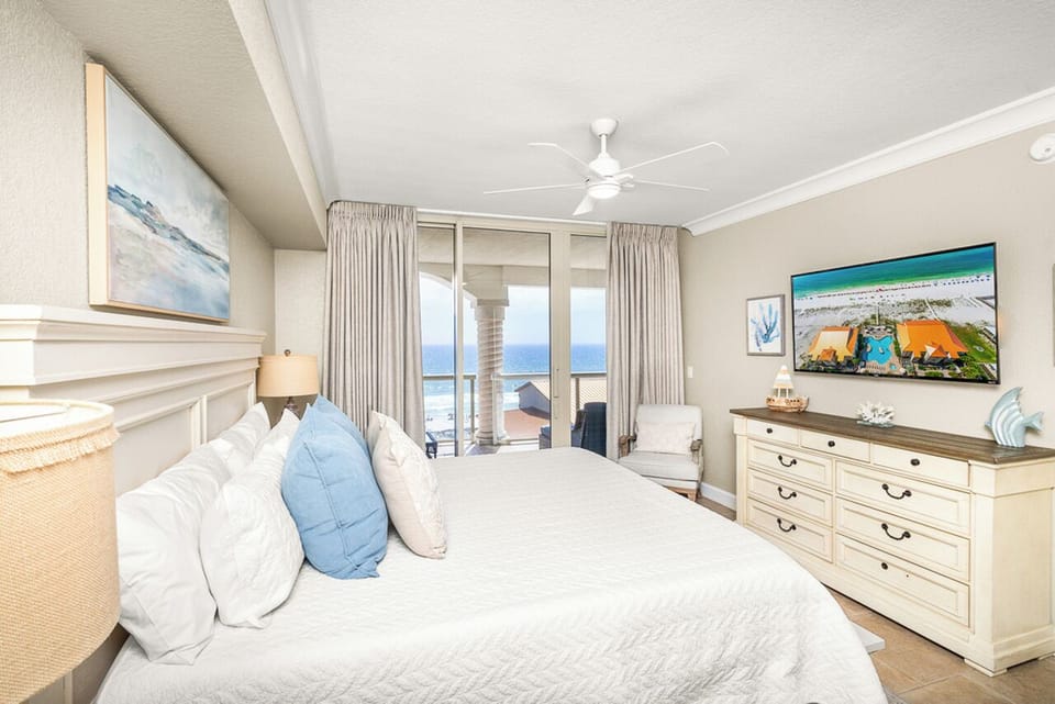 Wake up to stunning ocean views from your coastal bedroom retreat, where soft linens and gentle sea breezes create the perfect morning sanctuary.