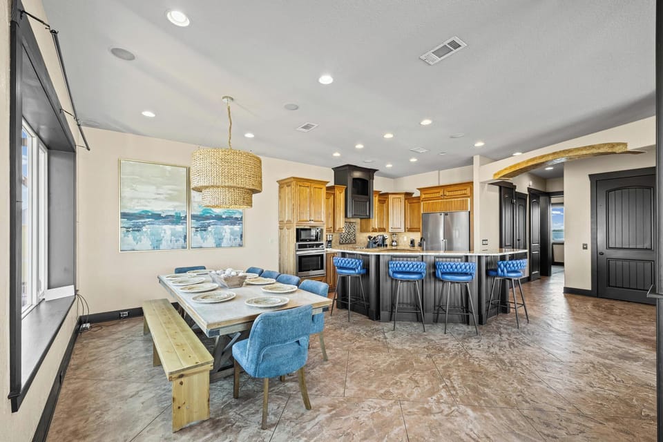 Unwind in this open-concept space where you'll create memories around the dining table and gather at the kitchen island for morning coffee.
