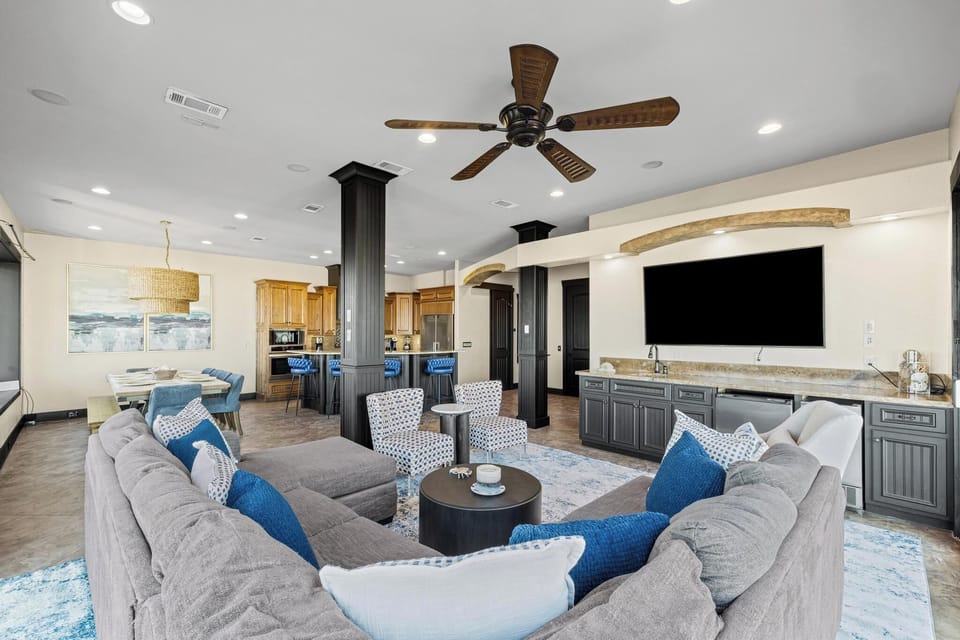 Unwind in this stunning open-concept living space where modern comfort meets elegant design, perfect for gathering with loved ones.