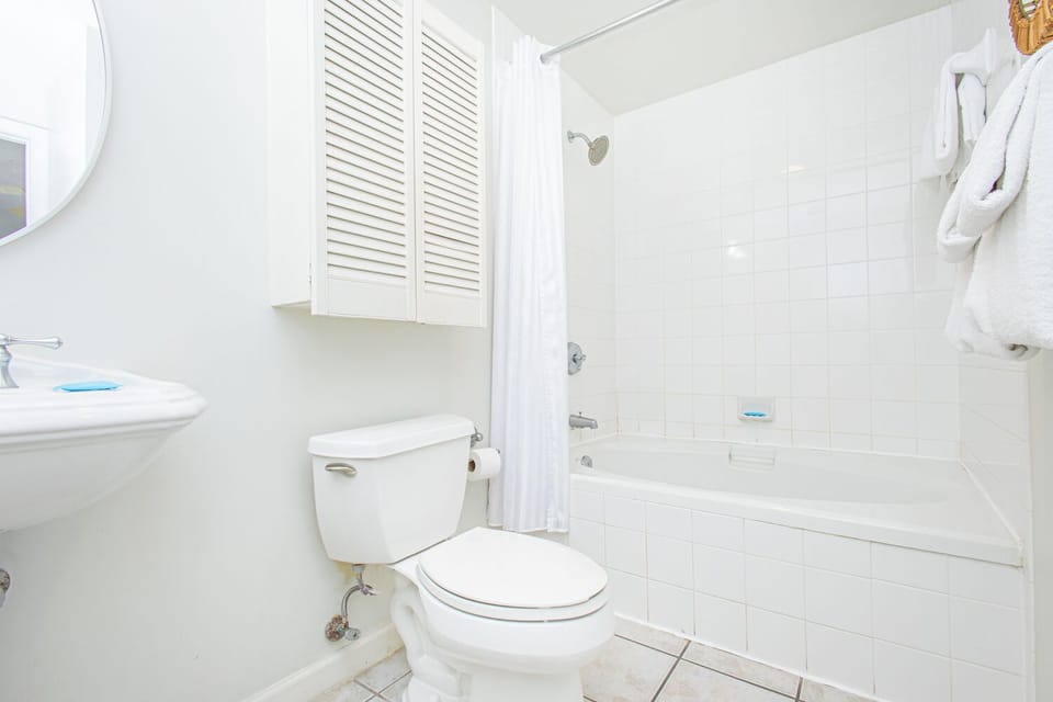 Your bright, clean bathroom features a tub-shower combo and soft white towels for a refreshing start or end to your day.
