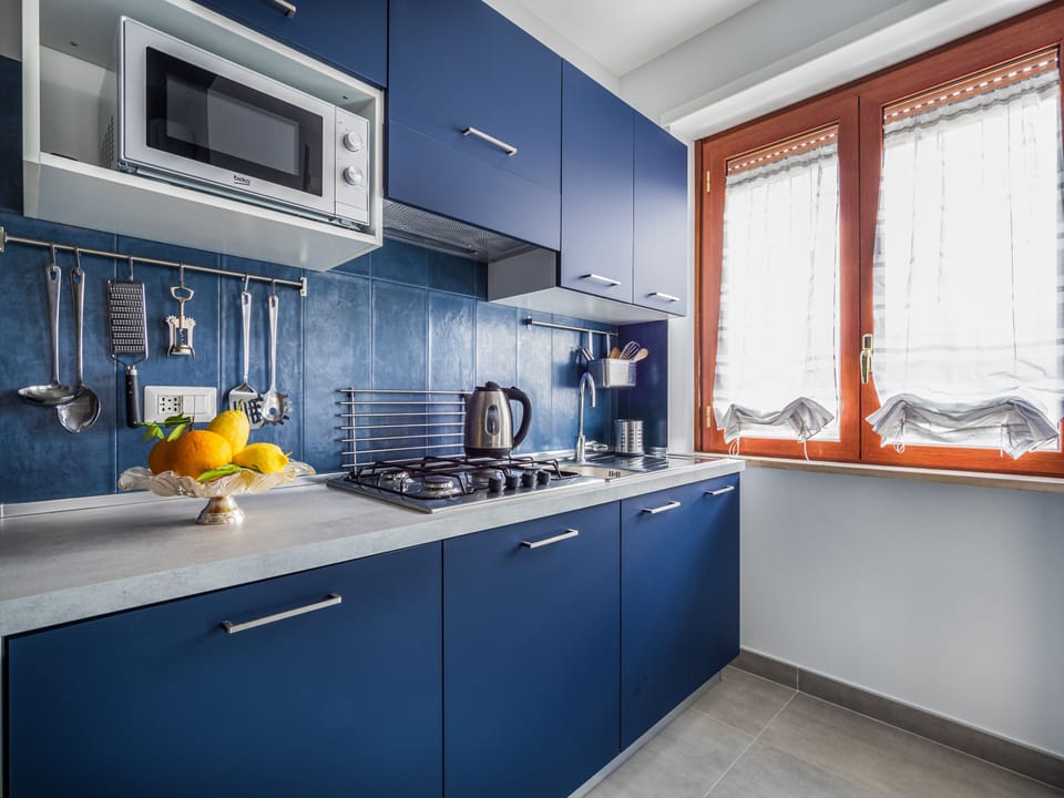 Superior Apartment | Private kitchen | Full-size fridge, microwave, oven, stovetop