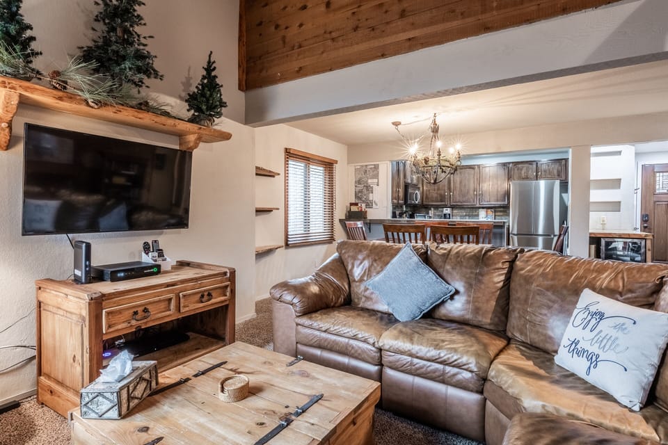 Living Room / Flat Screen TV / Wood Burning Fireplace