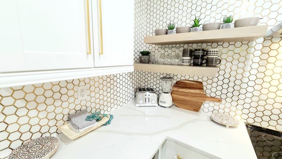 Quartz Counters & Gorgeous Honeycomb Marble Full Back Splash