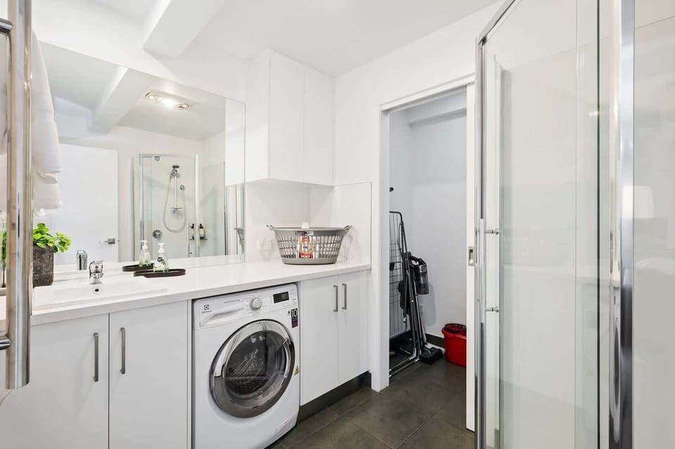Bathroom with laundry washer/dryer