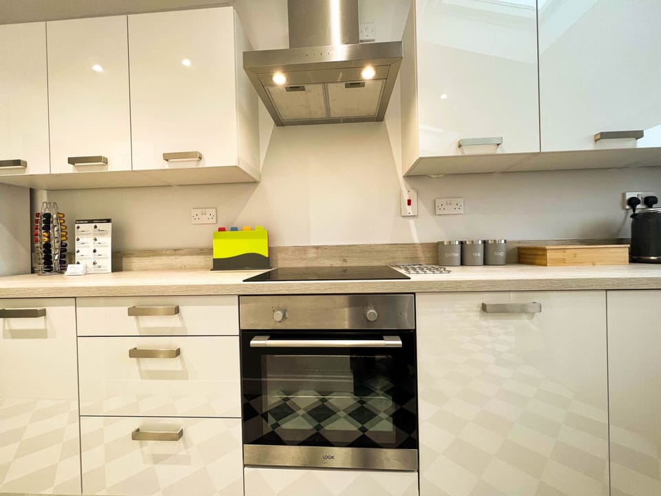 The fully equipped kitchen features modern amenities you will require