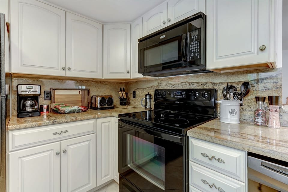 Kitchen | featuring an electric range