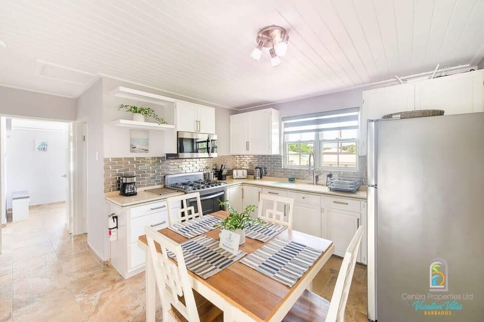 Fully-equipped kitchen for meals at home, plus a kitchen table for enjoying them.