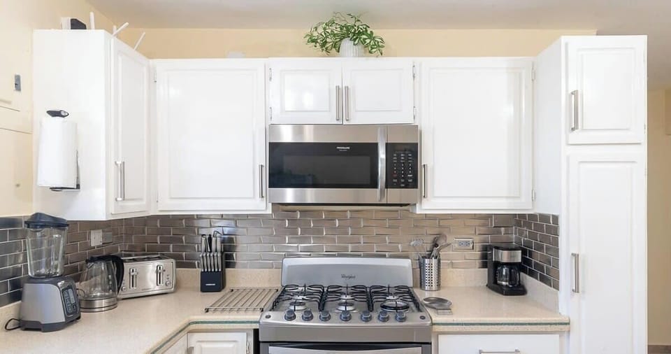 Prepare meals with ease in this open and airy space.