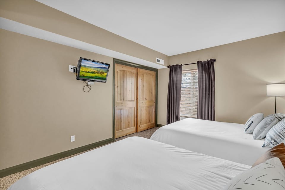 The charming second bedroom has everything you need for a comfortable stay.