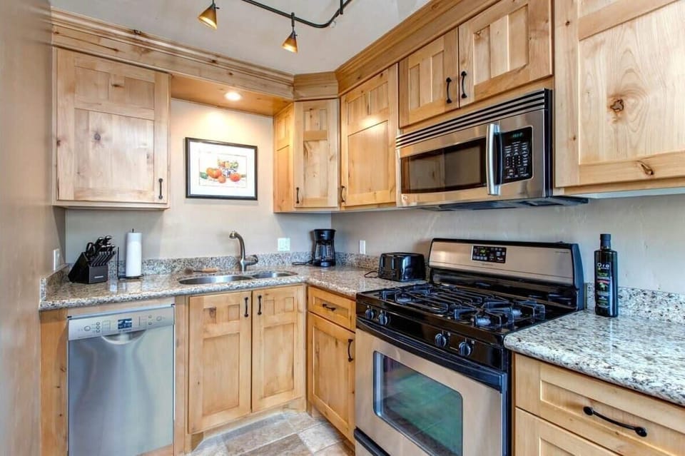 Fully-equipped kitchen with high-quality stainless steel appliances