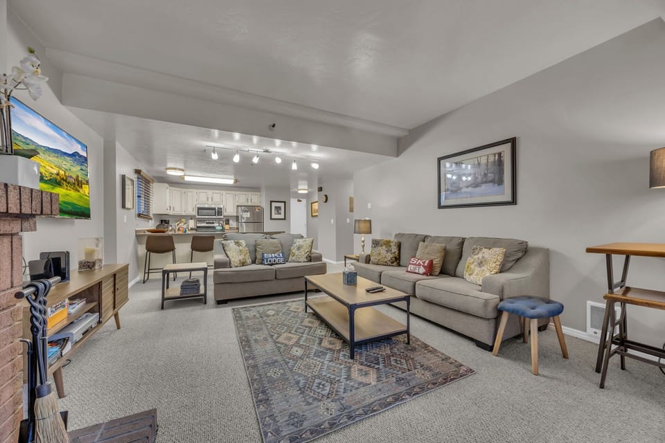 Living room: TV with cable, wood-burning fireplace (starter bundle of wood provided), electric baseboard heating, no A/C