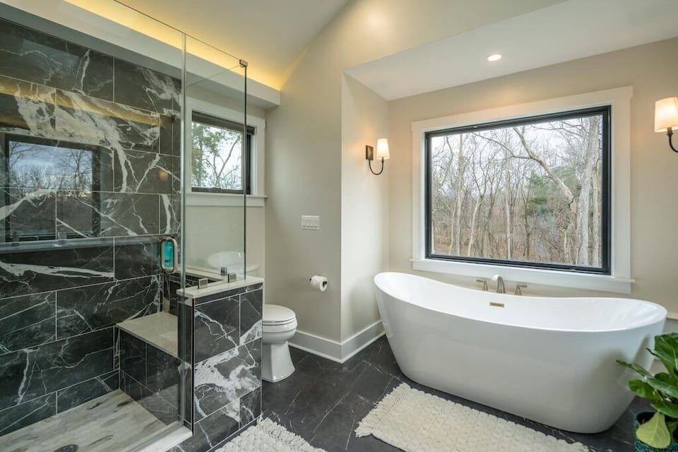Shower and soaker tub in main floor master bathroom