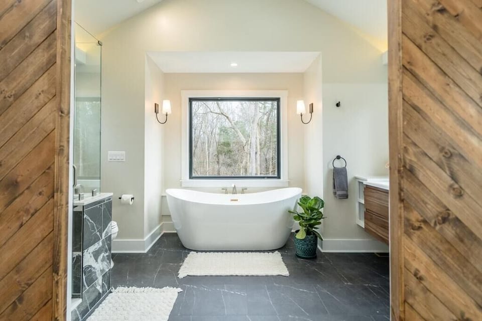 Soaker tub in main floor master bathroom