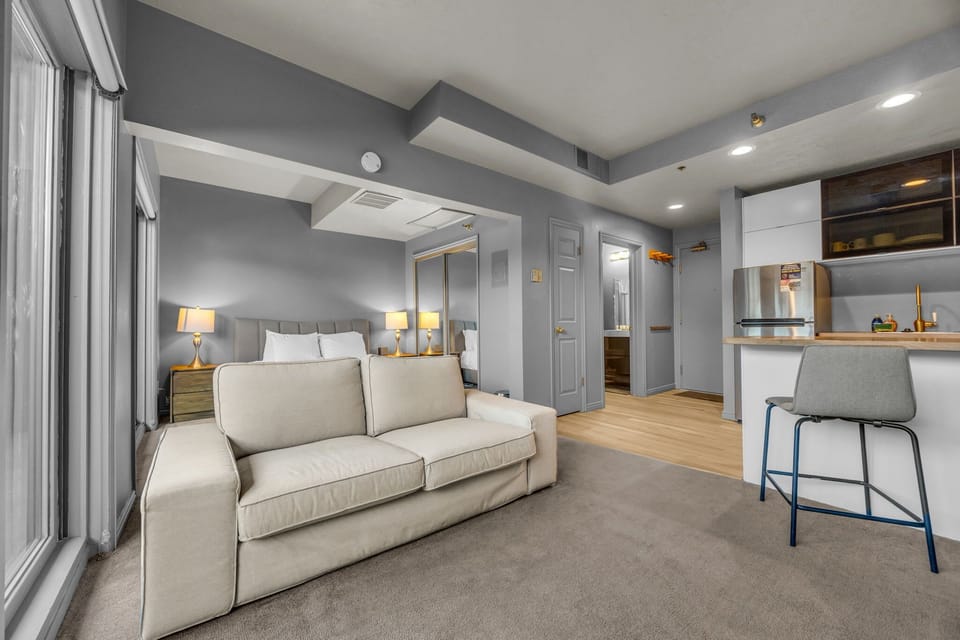 Living area: Smart TV with cable (40"), Building-controlled central heat and A/C (air speed can be adjusted by guests)