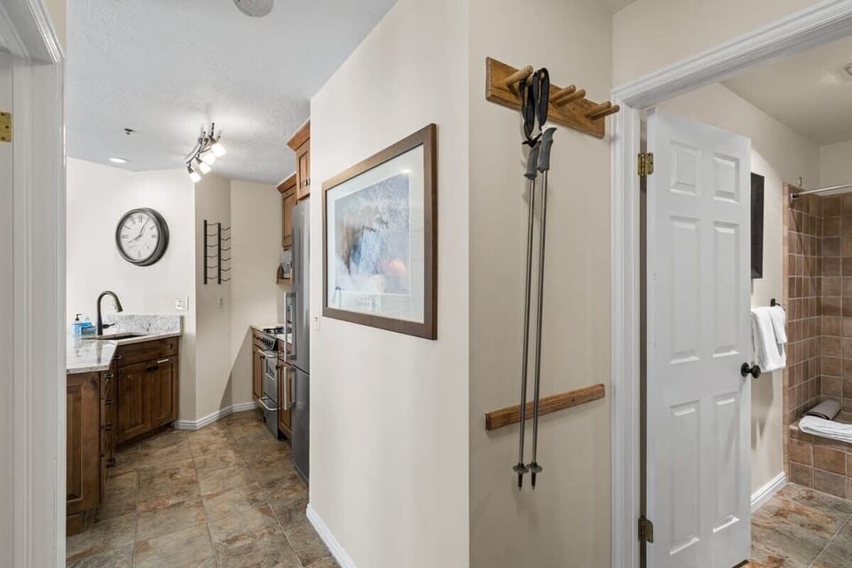 The entryway of the home includes coat hooks so you can hang up your outdoor gear before settling in.