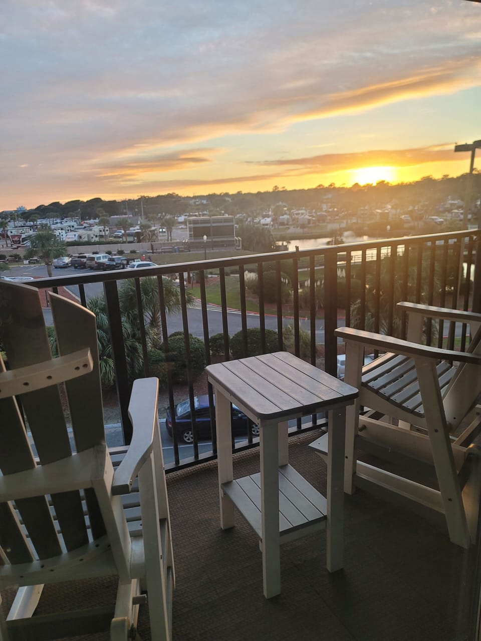 Watch the Sunset from the balcony on the high rocking chairs