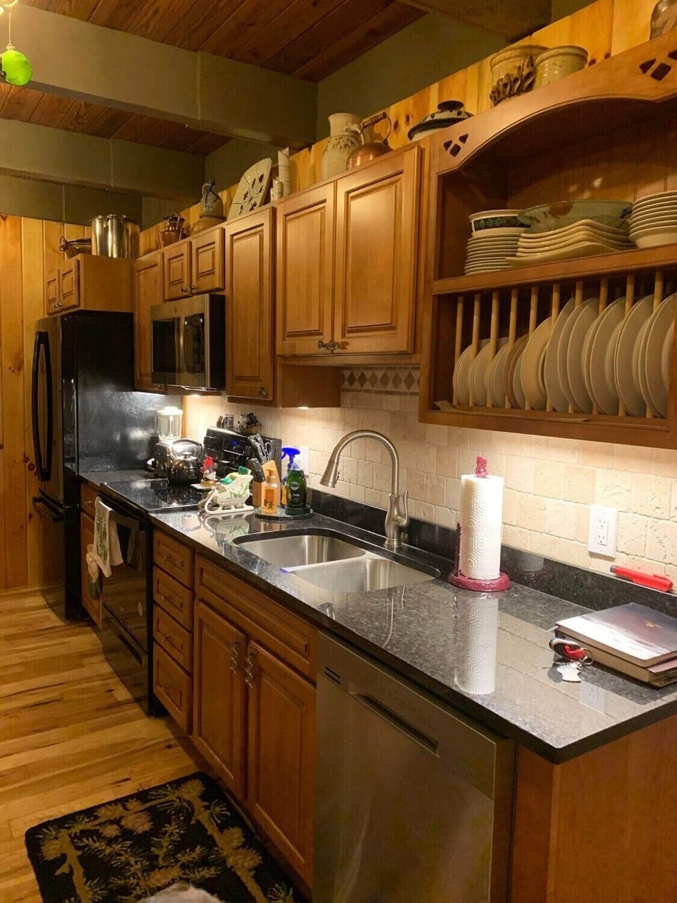 Kitchen area- granite countertops, maple cabinets,  dishwasher, microwave 