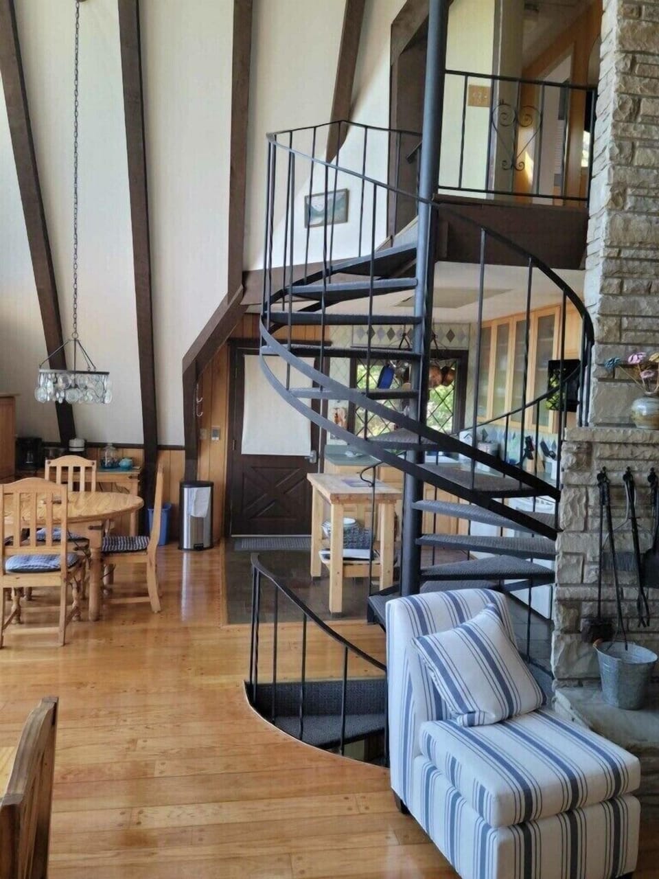 Spiral staircase up to the main bedroom area