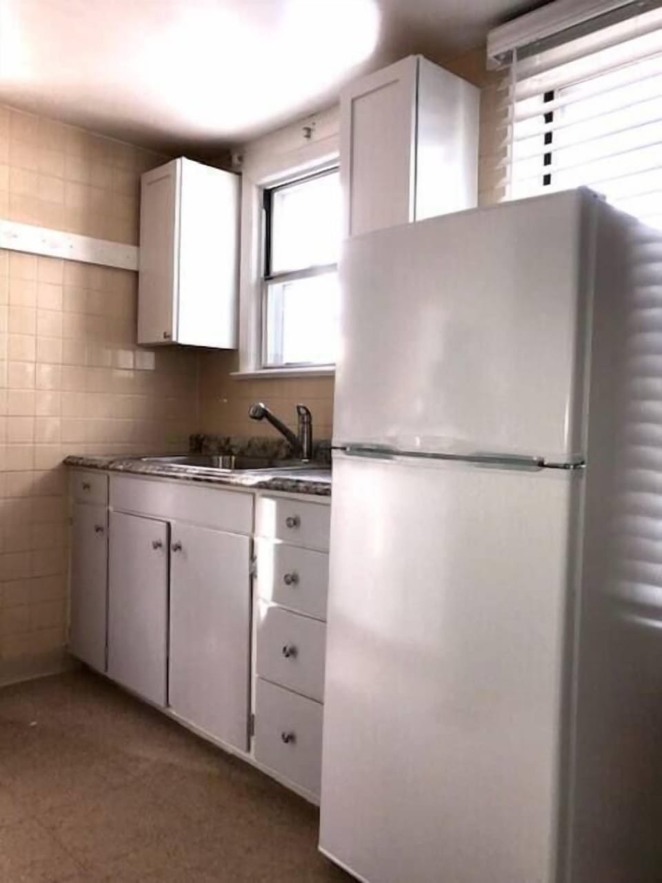 One side of the kitchen. Fully stocked with the essentials. 