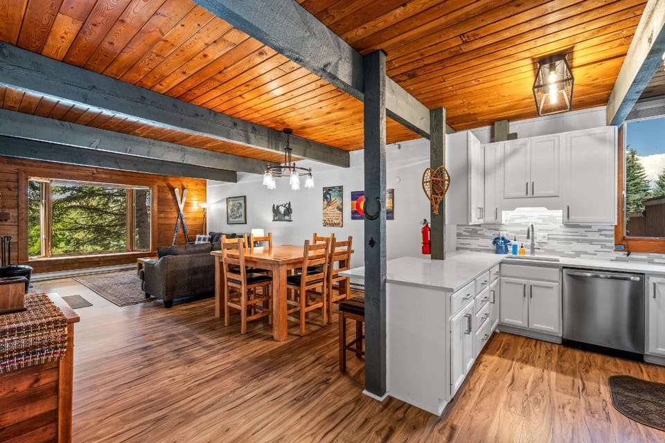 Great open floor plan from the kitchen, dining and living area. A truly cozy experience in all seasons.
