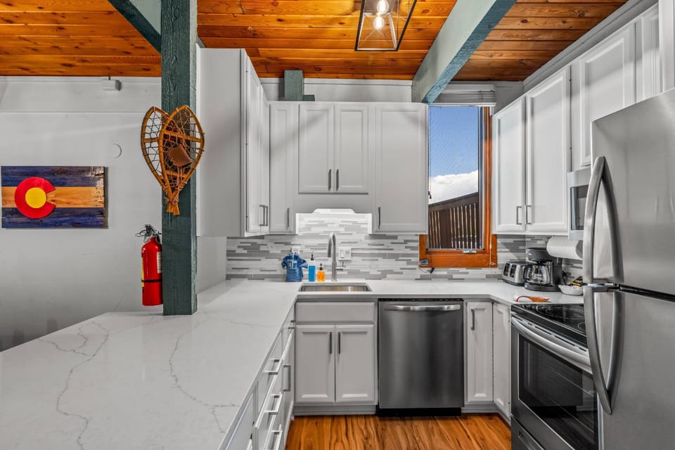 Modern kitchen with sleek countertops and plenty of space—perfect for casual dining or entertaining!