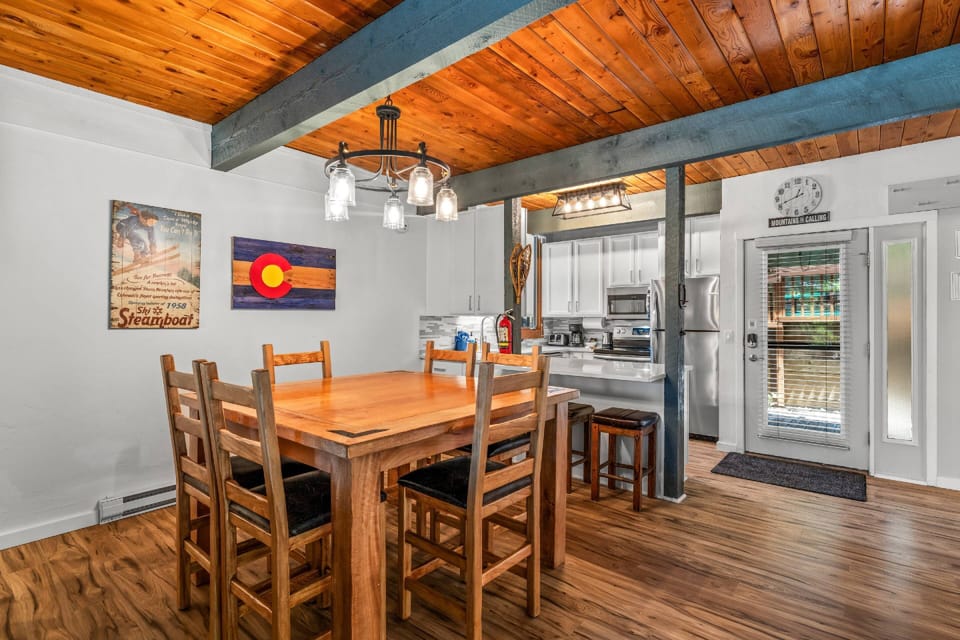 The dining area and kitchen seamlessly blend, providing continual conversations