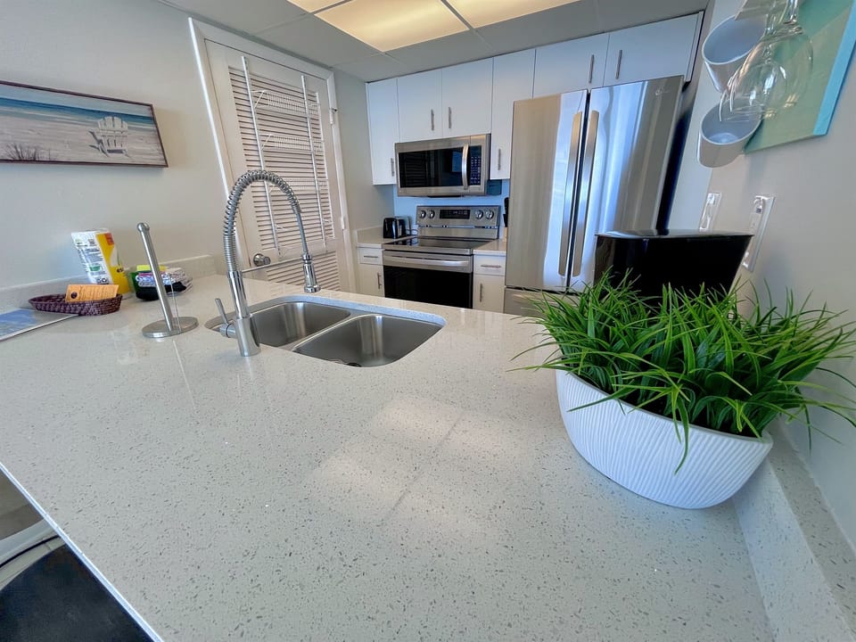 Clean and wide open counter tops with all new stainless steel appliances
