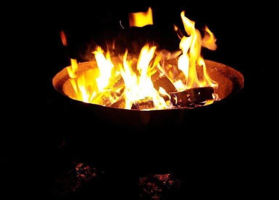 Sit around the warm firepit and enjoy the ambience. 