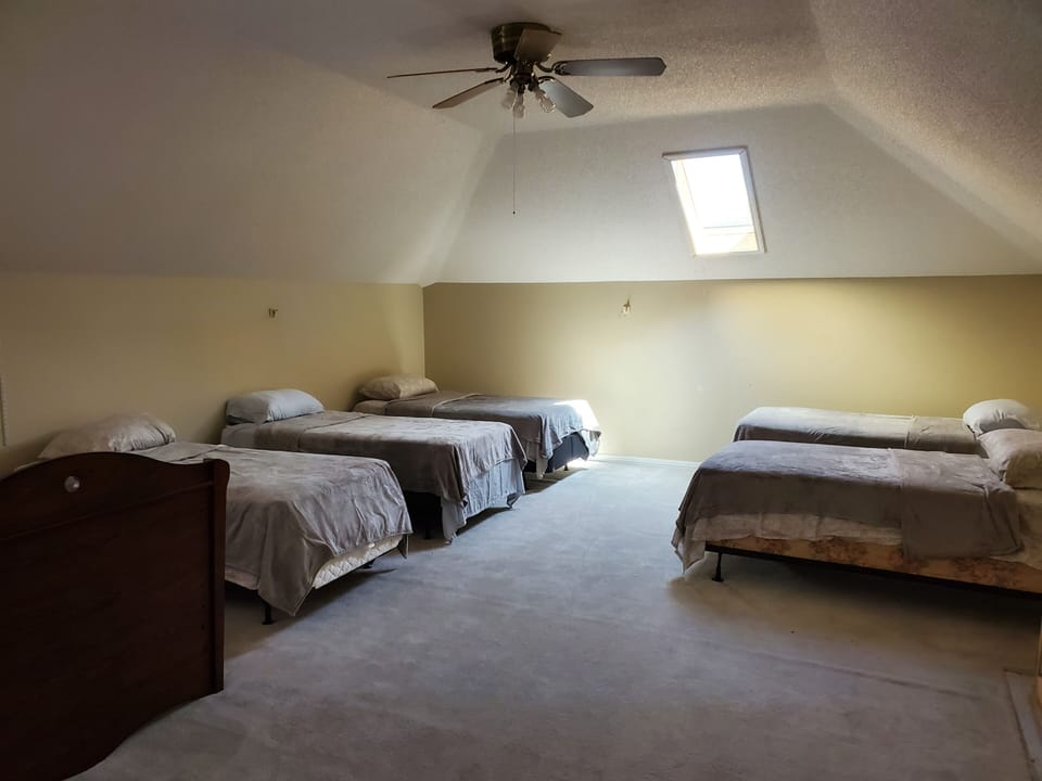 6 twins with wall mounted 65in smart TV